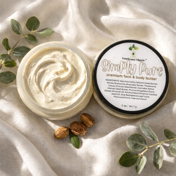TreeHouse Hippie's 'Simply Pure' premium face and body butter on a light fabric background with leaf accents and kokum seeds.