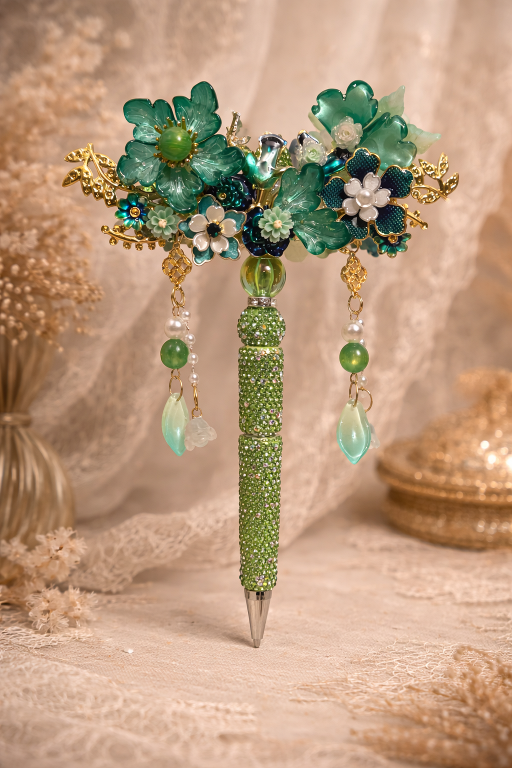 Extravagant decorative double-sided green bling pen with large and small flowers and gold accents on a lace-textured background