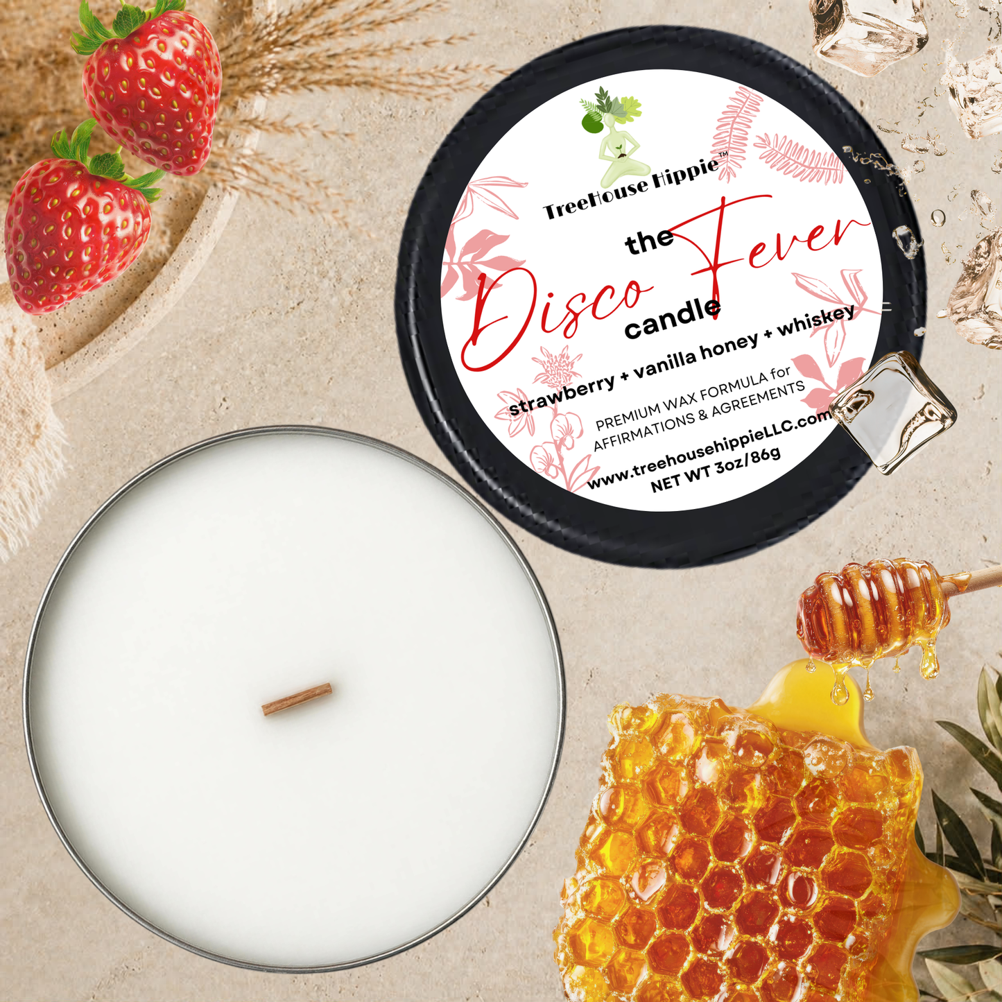 TreeHouse Hippie White Wax Travel-Size Candle in a Black Tin with bright Red Strawberries, Honey Comb, a Honey Stick, Ice Cubes, and splashes of Whiskey on a Beige Textured Surface.
