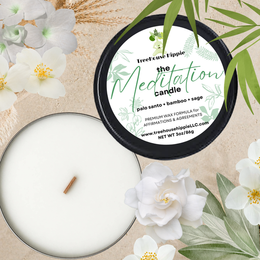 TreeHouse Hippie White Wax Travel-Size Candle in a Black Tin with Floral and Leaf Accents on a Beige Textured Surface.
